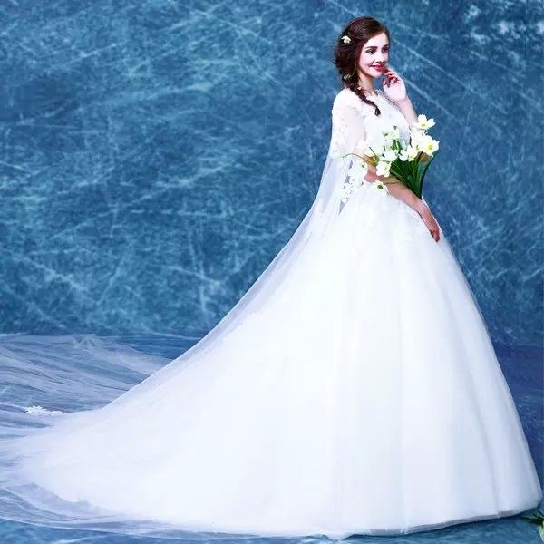 robe de mariée traîne chapelle en tulle Crédit photo : Persun.fr