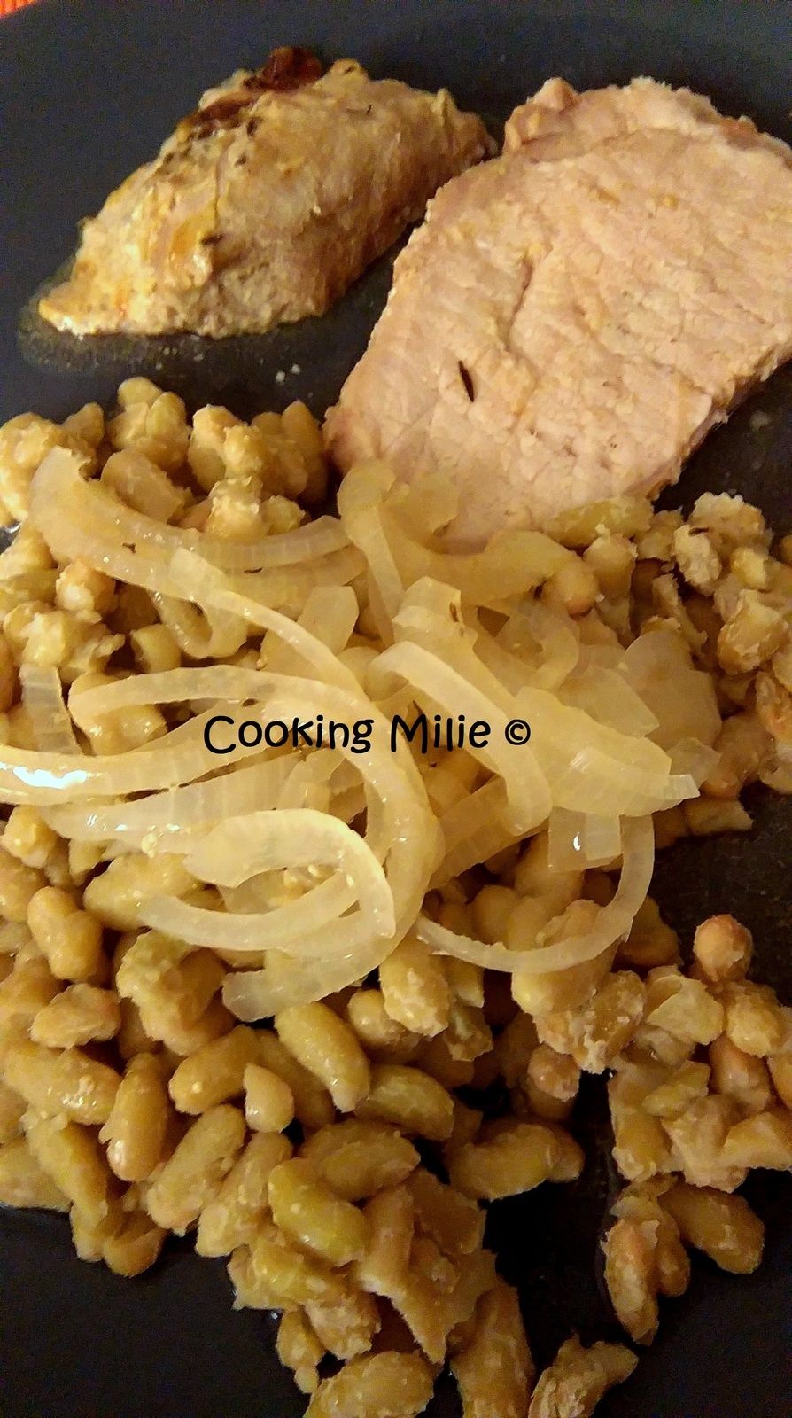 Rôti de porc à la moutarde, au miel et au thym