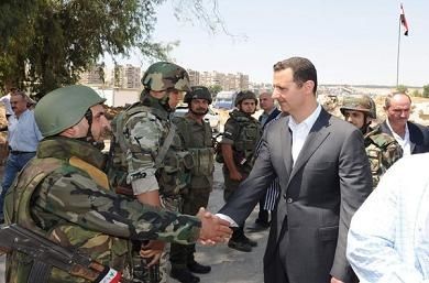 assad_soldats4Bachar el-Assad, que Sarkozy / BHL pensaient faire tomber comme Kadafi en Libye, félicite l’armée de défense syrienne pour sa résistance contre les groupes terroristes financés et armés par l’étranger
