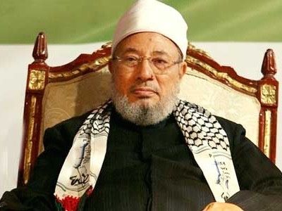 Cheikh Youssouf al-Qaradawi, prédicateur vedette des Frères musulmans et télé-coraniste sur al-Jazeera. Il bénit les jihadistes en Syrie et en Irak et affirme, sans rire, que si Mahomet était vivant aujourd’hui, il s’allierait à l’Otan.