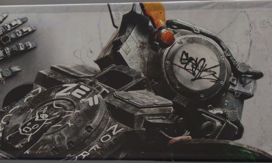 Chappie : le robot de Neill Blomkamp dessine sur les murs du Comic-Con