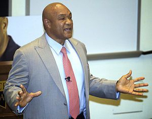 English: George Foreman speaking at the Rice A...