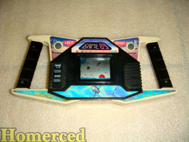Je recherche un jeux éléctronique depuis 25 ans ! Ob_c1ec85_jeu-elec1