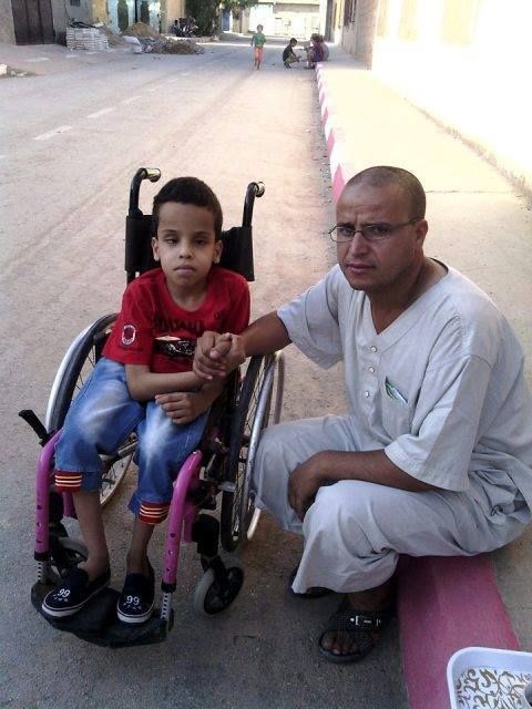 Mohcène avec son père, de Djelfa