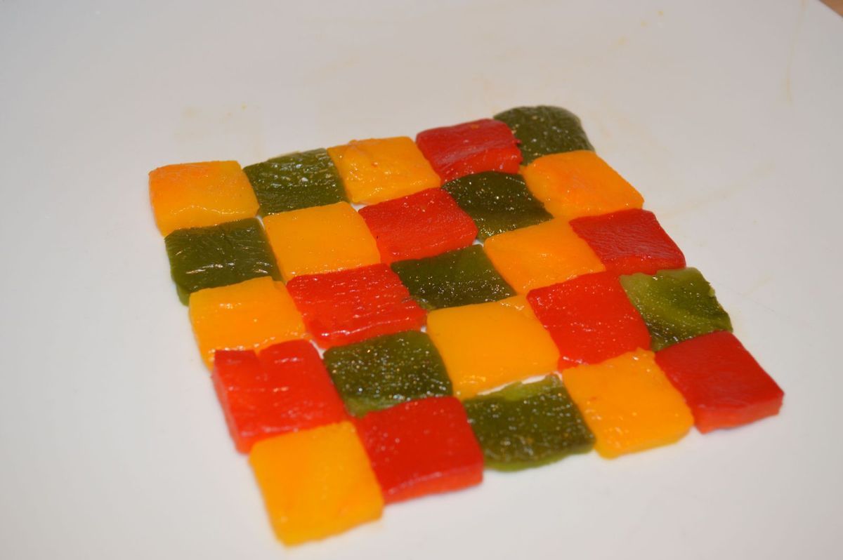 Cotelettes d'agneau au romarin et damier de poivron