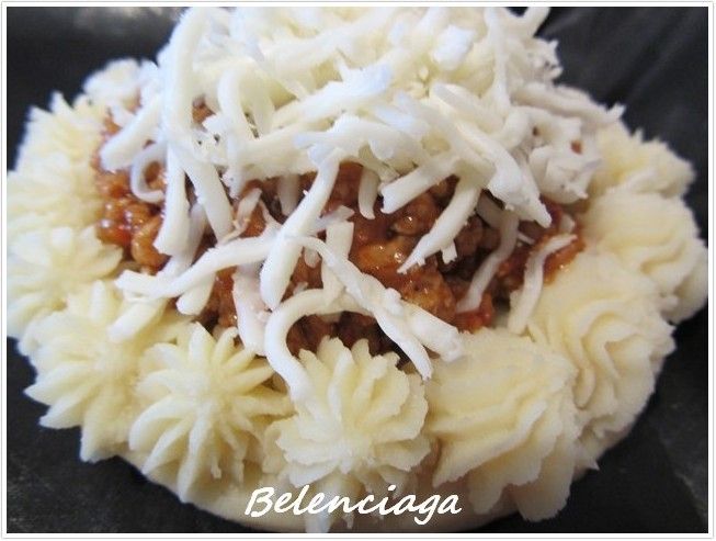 Tarttaletas de pure y boloñesa