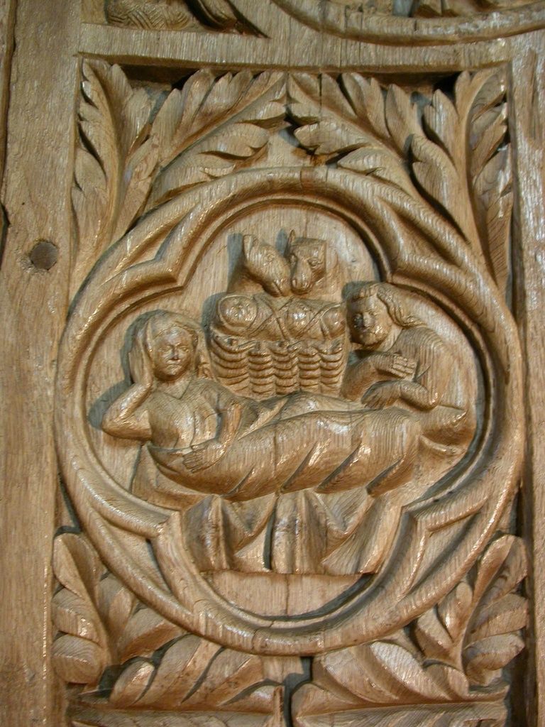 Nativité, sculptée sur la jouée gauche des stalles du XIVe siècle de Bar-le-Régulier (21430)