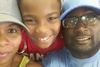 Keith Lamont Scott kun sia familio