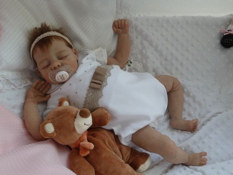 bébé reborn tellement vrai