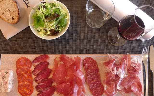 Start with well-aged Spanish ham or a selection of inventive tapas