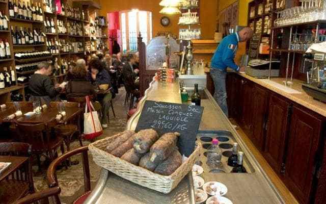 You can still pop in to buy a saucisson sec or bottle of wine