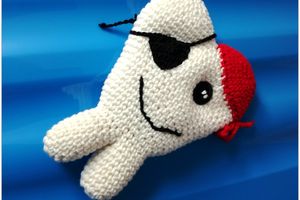 un coussin pour dent de lait au crochet