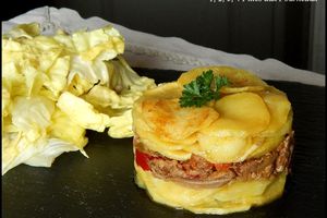 Mille-feuille de pomme de terre et de canard confit