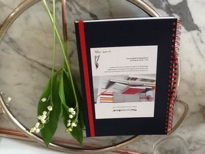 du muguet et mon cahier pour un 1 mai !