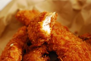 Pollo rebozado con cereales