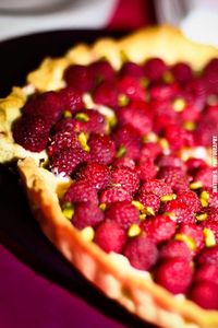 Tarte aux framboises et pistaches