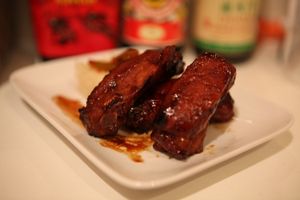 Travers de porc caramélisés aux épices et agrumes