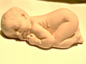 bébé en porcelaine froide ou PAM