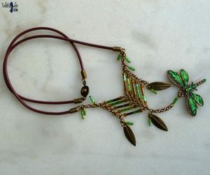 Susweca - Collier cuir et laiton vieilli au pendentif Libellule et rocaille style ethnique Sioux Lakota