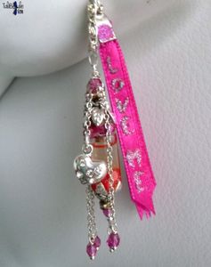 Love Me - Sautoir amulette féérique et sa réserve de coeurs pour envoutement d'amour dans un flacon miniature de style féérique