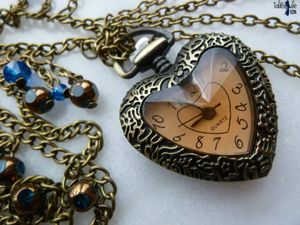 Lov'Heure - Sautoir au pendentif montre à quartz en forme de coeur bronze antique et cristal