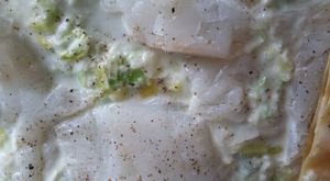 lasagnes cabillaud,lardons, courgettes ,sur un lit de poireaux,aux 3 fromages