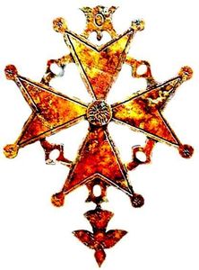 Croix huguenote taillée dans un schiste des Cévennes.