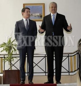 Les Premiers ministres algérien et français.