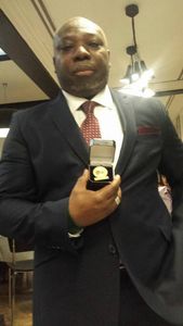 ABDON BAYETO UN CONSEILLER DU PRESIDENT GBAGBO DECORE EN ANGLETERRE