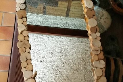 Miroir avec rondelles de bois flotté