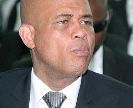 rencontre entre martelly et aristide