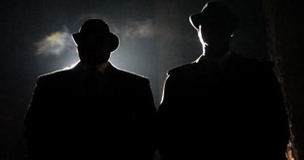 Les Hommes en Noir aux gants noirs