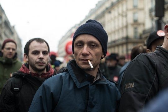 Photo : manifestant dans le cortège de la CGT lors de la journée d’actions du 9 mars contre le projet de réforme du droit du travail / © Eros Sana