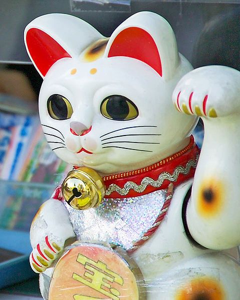 Maneki-Neko, chat porte-bonheur, Histoire, Légende, Japon