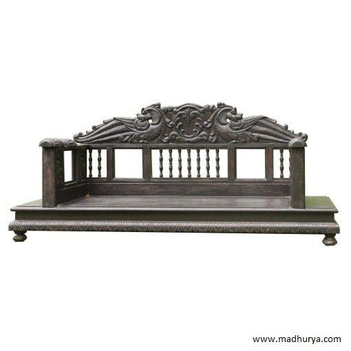 Elaborately worked heritage swing with Yali-engraved backrest made in highly durable teak wood. The carvings in the armrests and the front of the seat are simply a feast for the eyes.