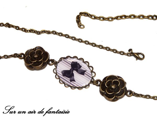 Head band, bijou de tête, sur base bronze avec cabochon nœud.