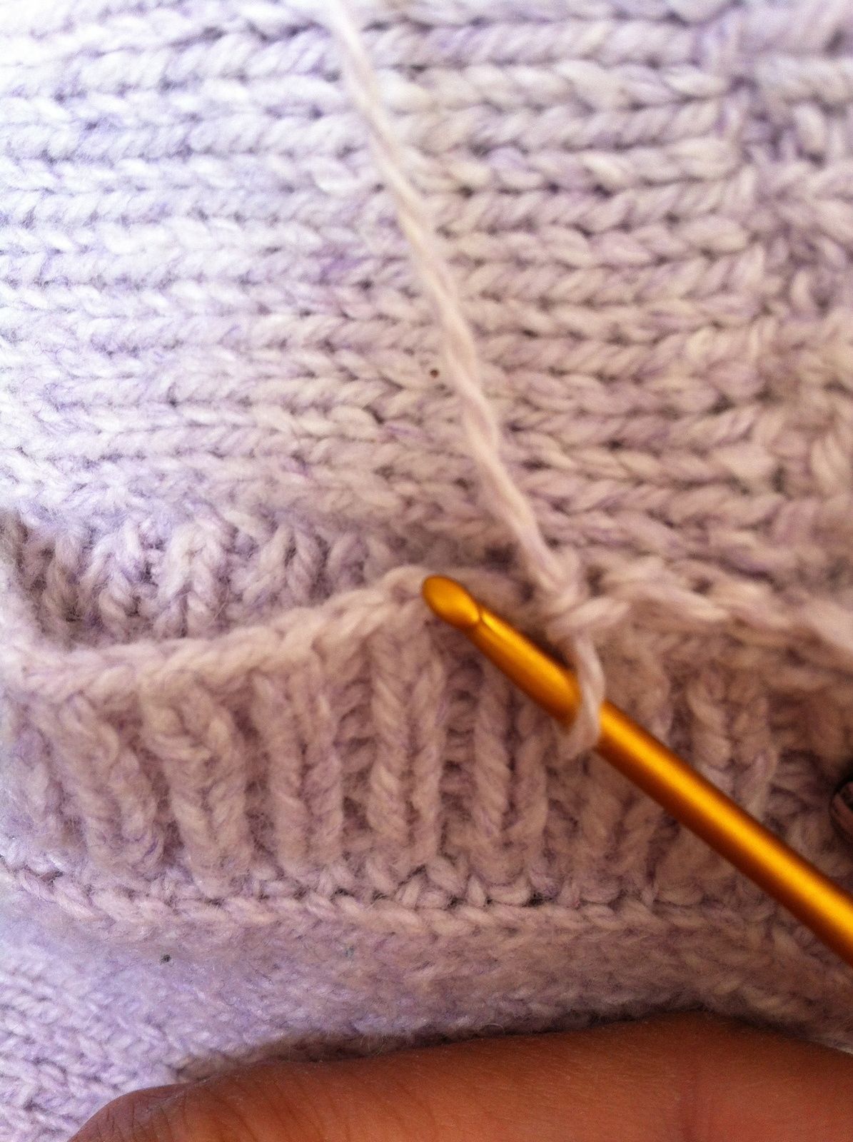 Tuto : Sauver un gilet qui baille entre les boutonnières