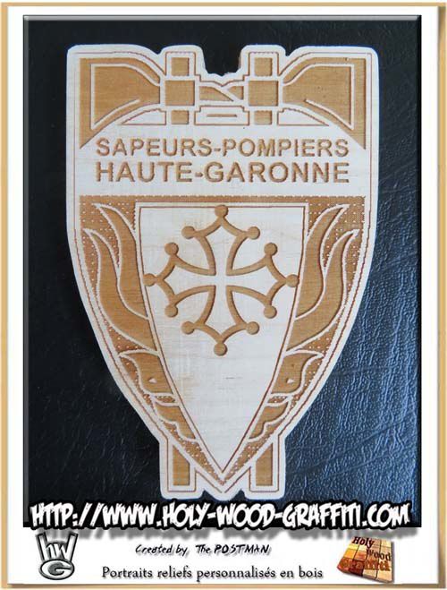 Logo des sapeurs -pompiers de Haute-Garonne avec la croix occitane.