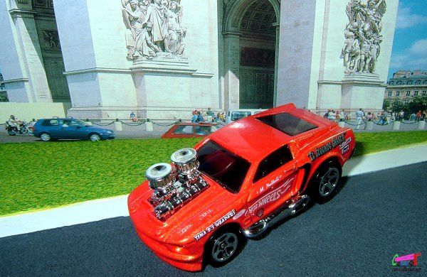 1968-mustang-tooned-orange-2006-128-hot-wheels-1-64
