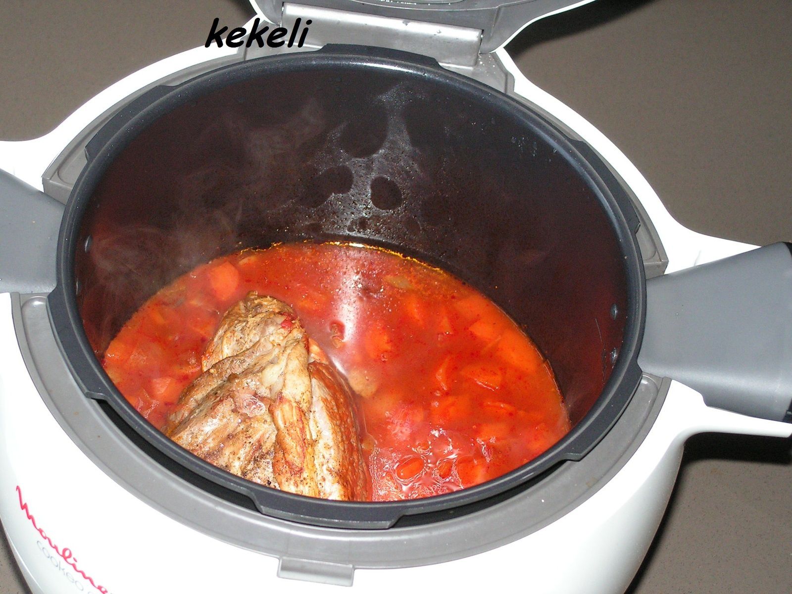 Rôti de porc à la sauce tomate au cookéo - Le blog de kekeli