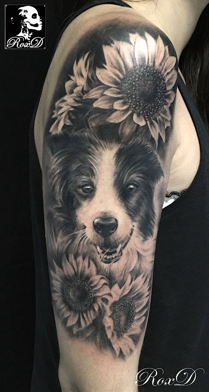 dog flowers tattoo