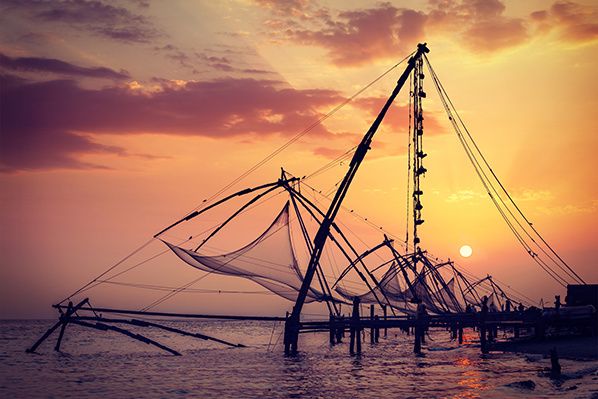Chinese fishnets on sunset. Kochi, Kerala, India © f9photos