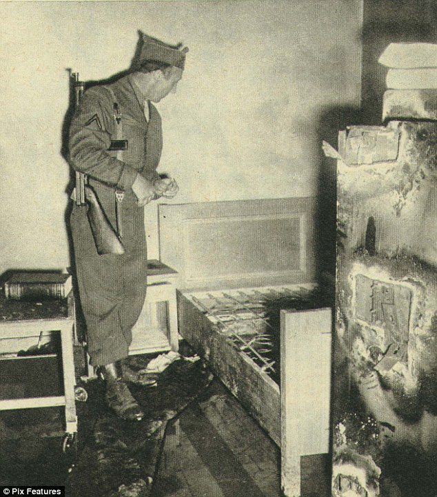 A soldier of the US Occupation Forces photographed in Hitler's bedroom in the tyrant's bunker. While the Fuhrer lay in the early hours of April 29, 1945, the Russian bombardment of Berlin intensified