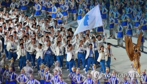 Rapprochement sportif inter-coréen : émotion et fierté lors du défilé conjoint en ouverture des Jeux asiatiques