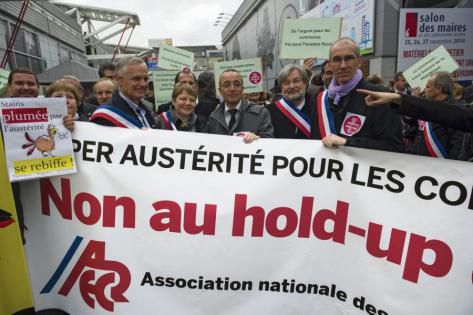 Manifestation de l’Association nationale des élus communistes et républicains (Anecr) lors du dernier congrès des maires de France, le 27 novembre 2014 Photo : Patrick Nussbaum