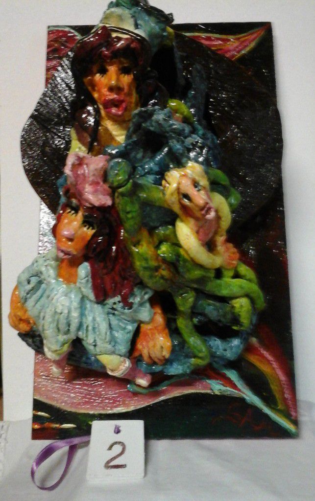 " Via la planète interdite " sculpture murale : bois, pâte résine. Peinture acrylique . 32 cm x 16 cm.