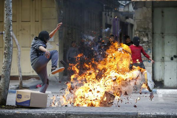 AFP Heurts entre manifestants palestiniens et soldats israéliens dans la ville de Hébron en Cisjordanie, le 6 février 2020 © AFP - HAZEM BADER