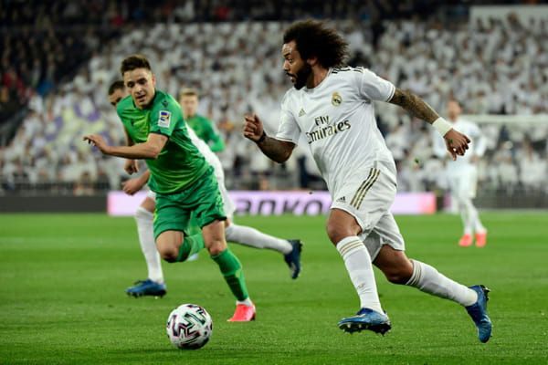 AFP Le défenseur brésilien du Real Madrid Marcelo poursuivi par le défenseur de la Real Sociedad Andoni Gorosabel en quart de finale de la Coupe du Roi, le 6 février 2020 au stade Santiago-Bernabeu © AFP - JAVIER SORIANO