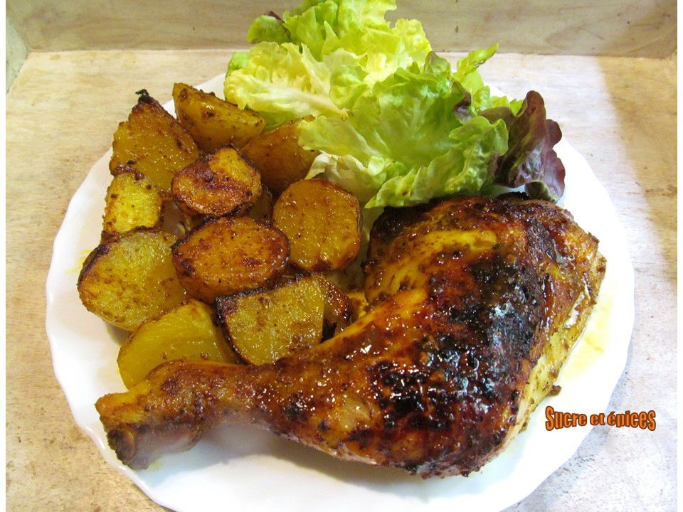 Cuisses de poulet et pommes de terre aux épices cuites au four