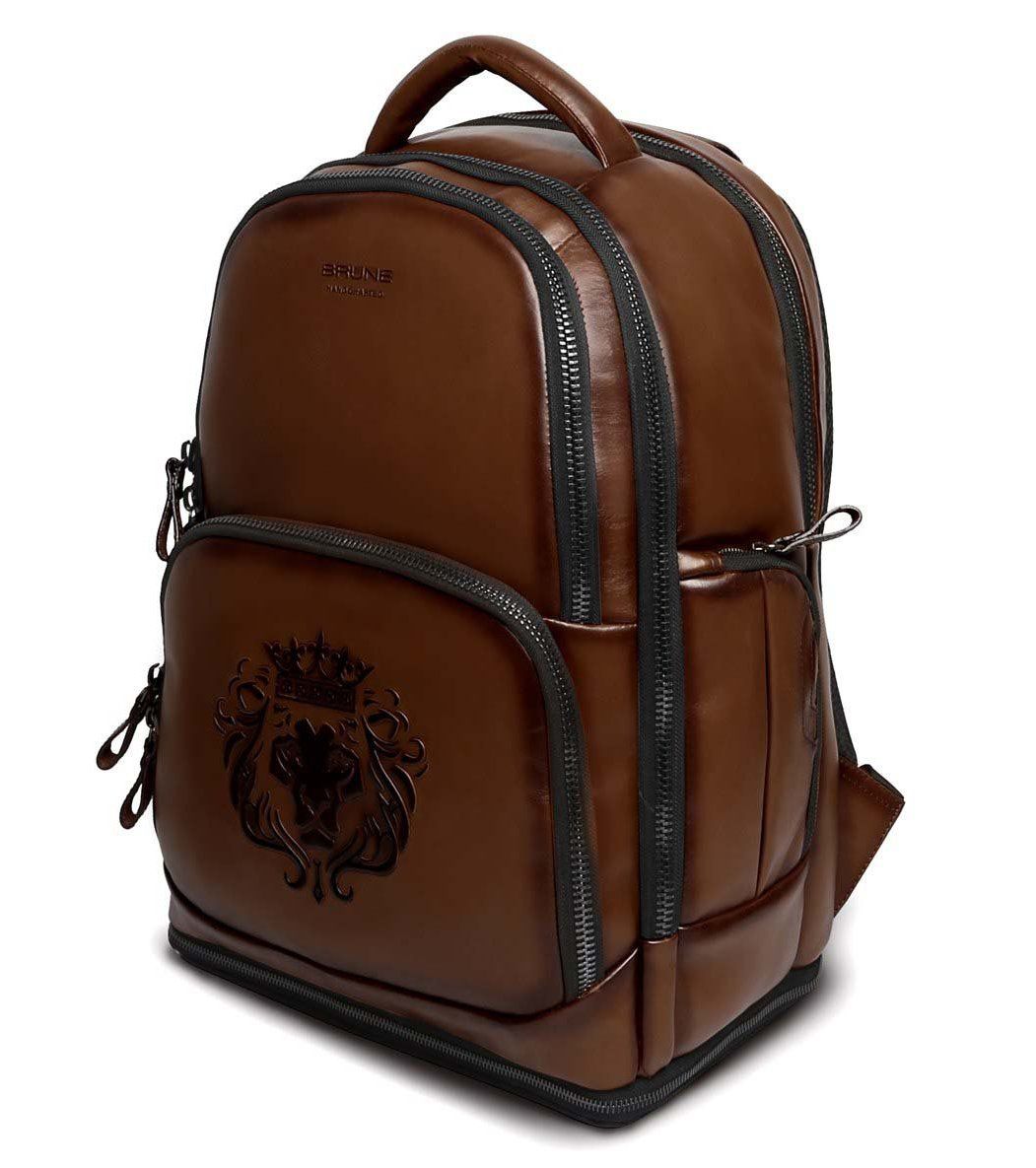 BRUNE X BARESKIN EMBOSSED LION CONCEALED COMPARTMENT BROWN LEATHER BACKPACK